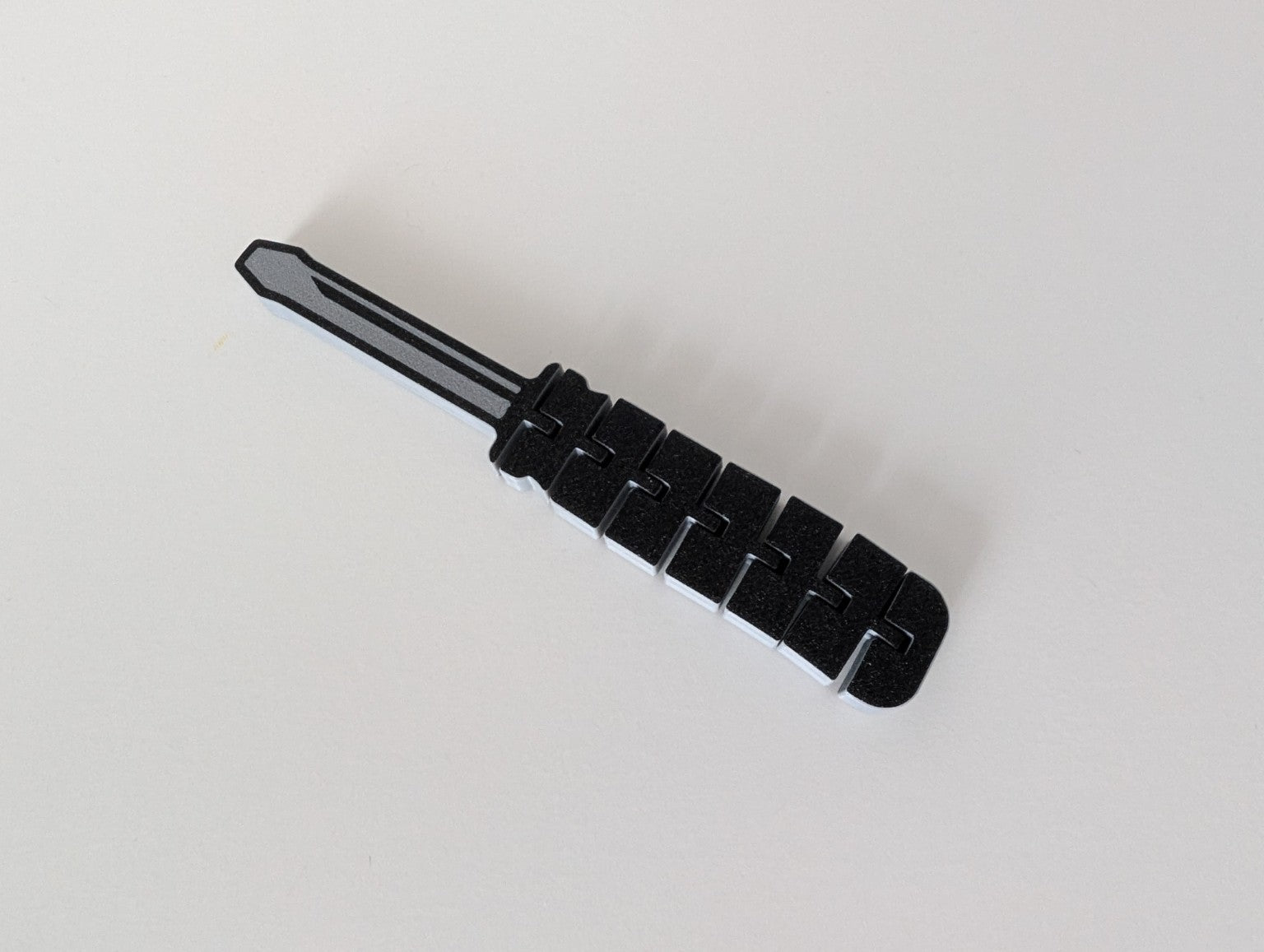 Jouet articulé en forme d'outils